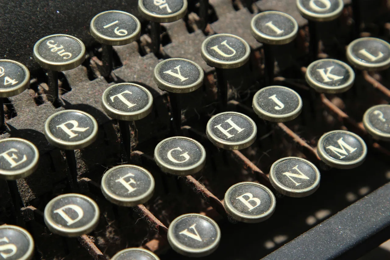 Close-up of vintage typewriter keys.